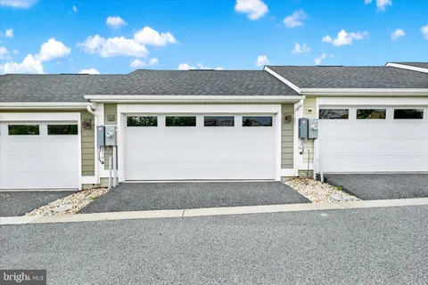 a view of a garden with a fountain