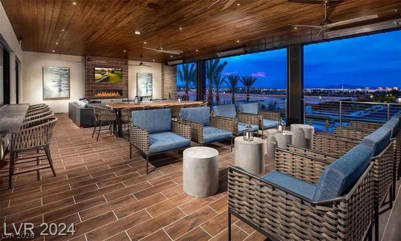 4246 Swift Street Las Vegas, NV 89135 - Photo 65 of 71 View of patio / terrace with a ceiling fan and an outdoor lounge area with bar