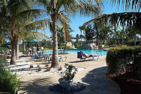 a view of outdoor space with seating area and trees