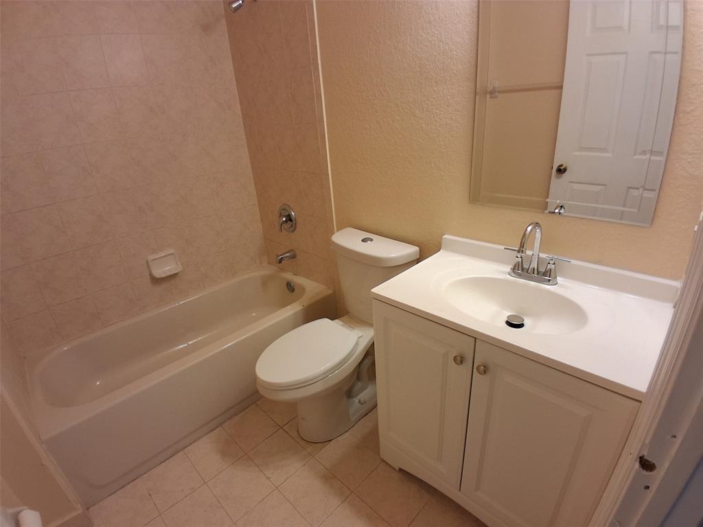 1425 Southeast 24th Court Homestead, FL 33035 - Photo 11 of 29 a bathroom with a sink toilet and shower
