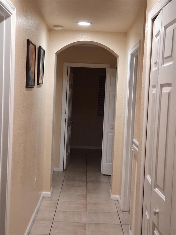 1425 Southeast 24th Court Homestead, FL 33035 - Photo 18 of 29 a view of a hallway with entryway door
