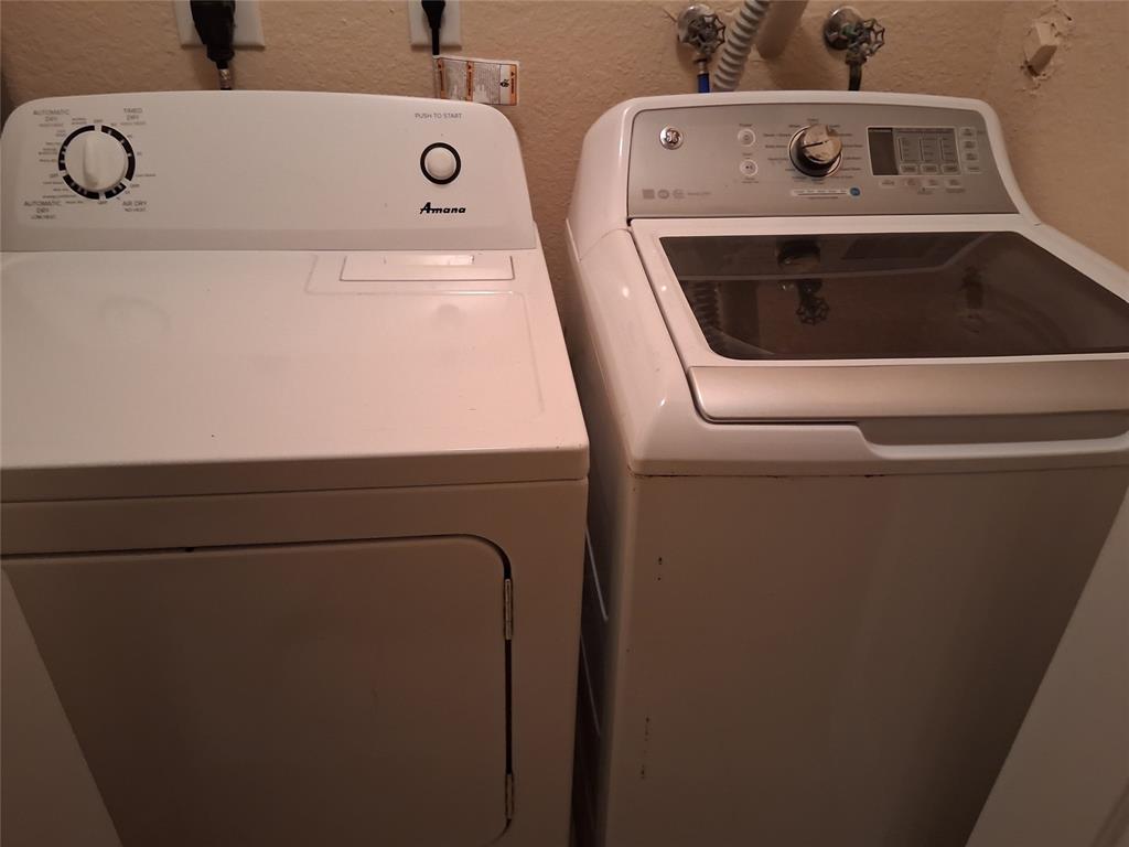 1425 Southeast 24th Court Homestead, FL 33035 - Photo 19 of 29 a utility room with dryer and washer
