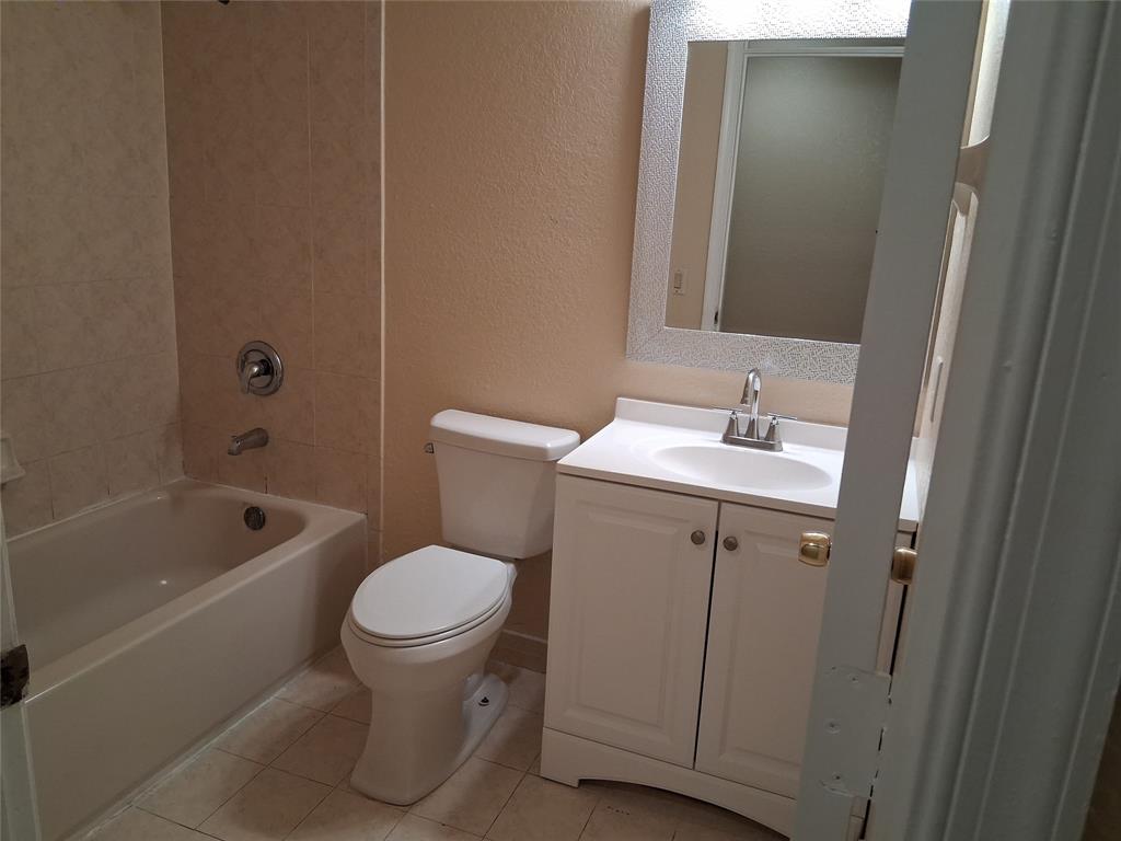 1425 Southeast 24th Court Homestead, FL 33035 - Photo 22 of 29 a bathroom with a sink toilet and shower