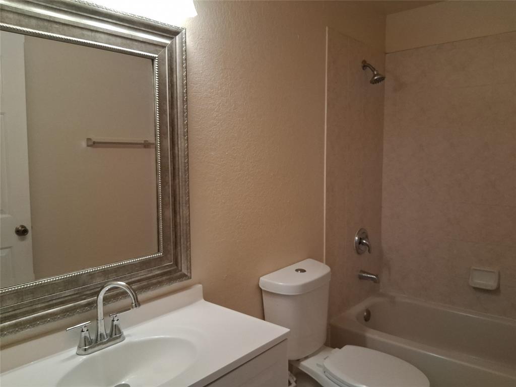 1425 Southeast 24th Court Homestead, FL 33035 - Photo 27 of 29 a bathroom with a sink toilet and shower