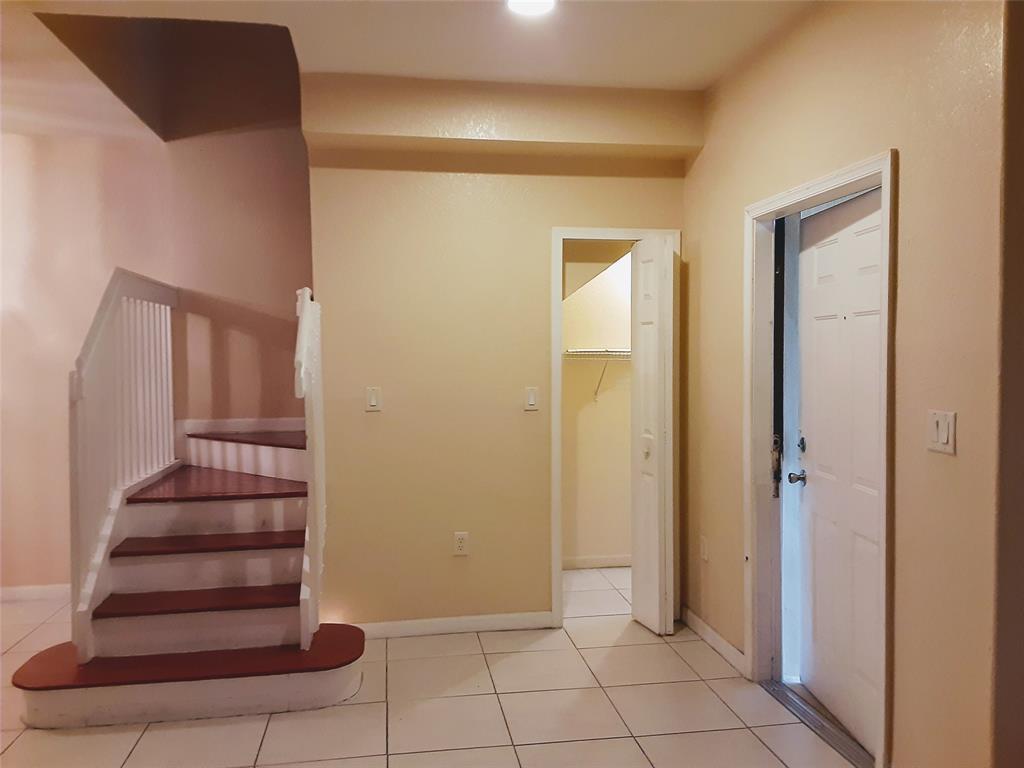 1425 Southeast 24th Court Homestead, FL 33035 - Photo 3 of 29 a view of entryway with wooden floor