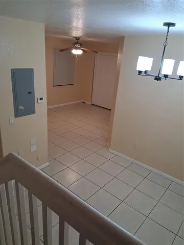 a view of a livingroom and entryway