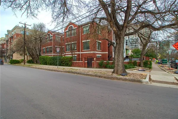 a view of road with a building in the background