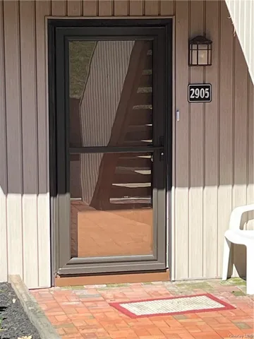 a view of a entryway door of the house