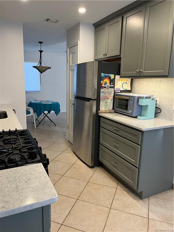2905 Fox Lane Poughkeepsie, NY 12603 - Photo 16 of 21 a kitchen with stainless steel appliances granite countertop a refrigerator a stove and a sink