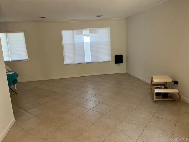 a bathroom with a sink and a window