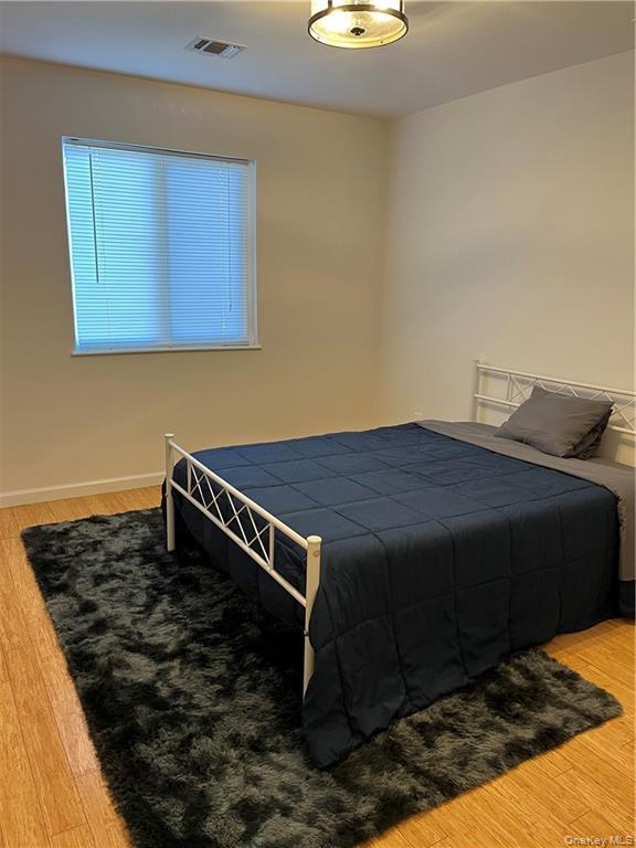 2905 Fox Lane Poughkeepsie, NY 12603 - Photo 21 of 25 a bedroom with a bed and a cabinets