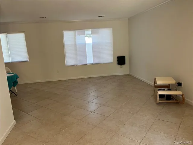 a bathroom with a sink and a window