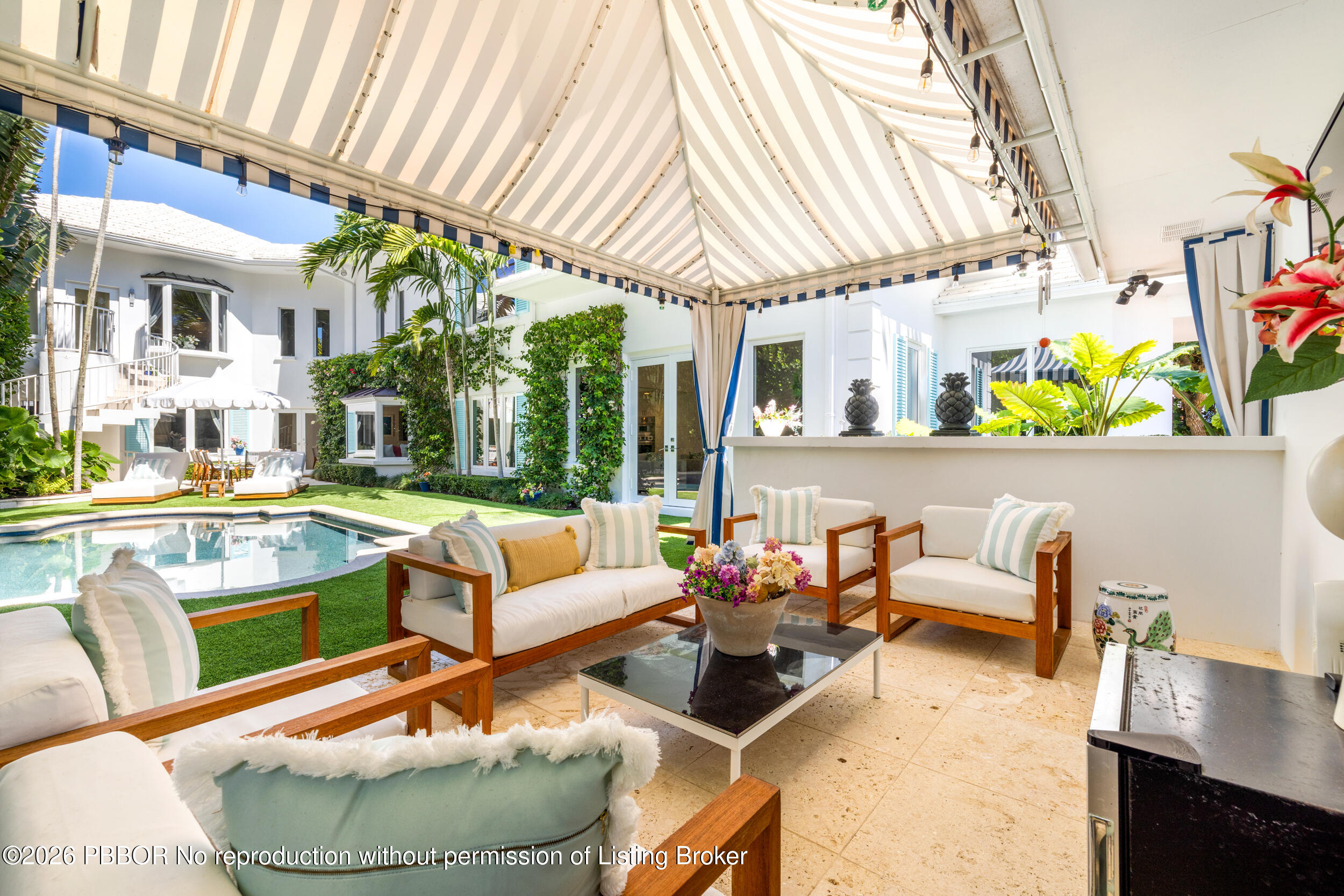 121 Seville Road West Palm Beach, FL 33405 - Photo 53 of 67 a outdoor living space with furniture and garden view