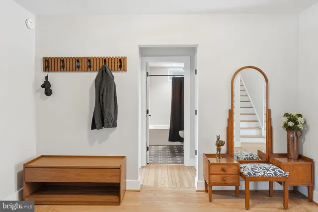 a kitchen with kitchen island a counter top space and a refrigerator