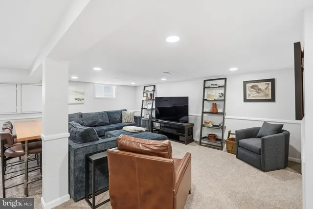 a view of a house with snow on the background