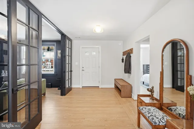 a bedroom with a bed and a fireplace