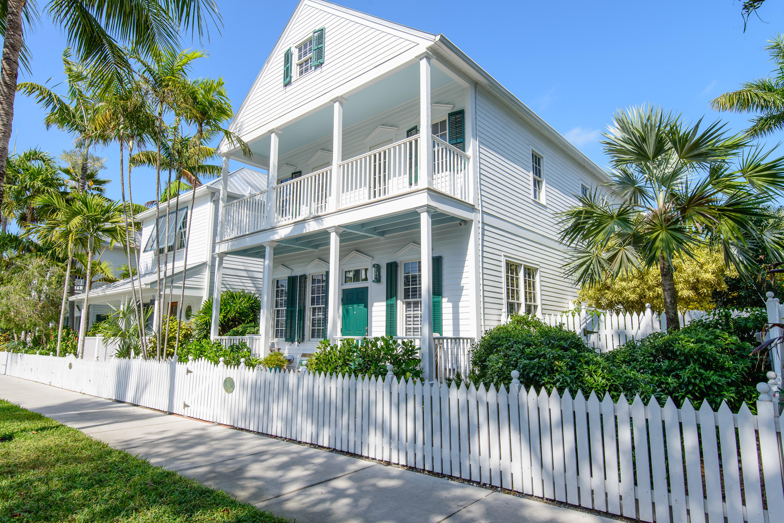 514 Emma Street Key West, FL 33040 - Photo 1 of 1 a front view of a house with a garden