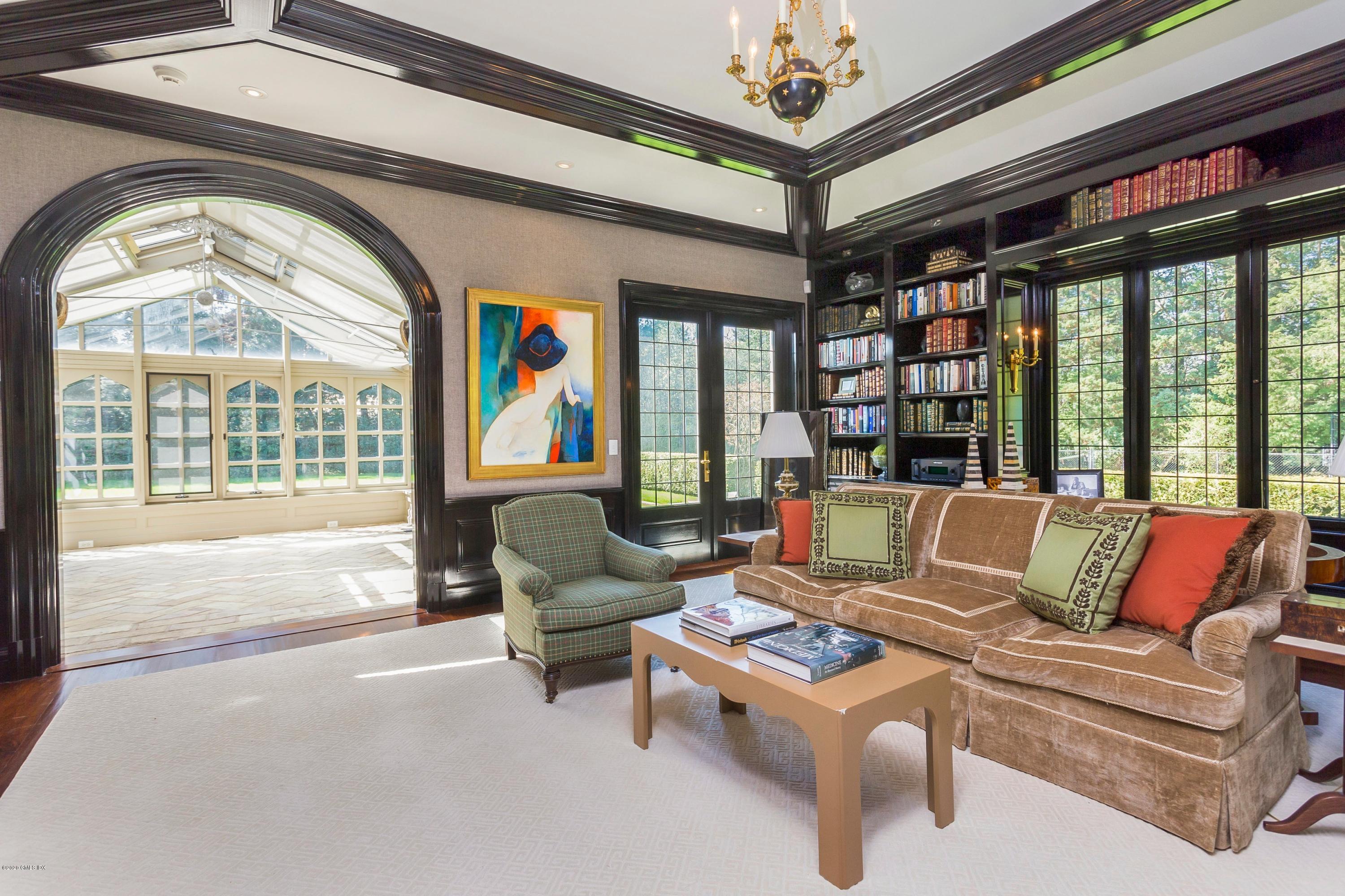 2 Broad Road Greenwich, CT 06830 - Photo 23 of 39 a living room with furniture and a large window