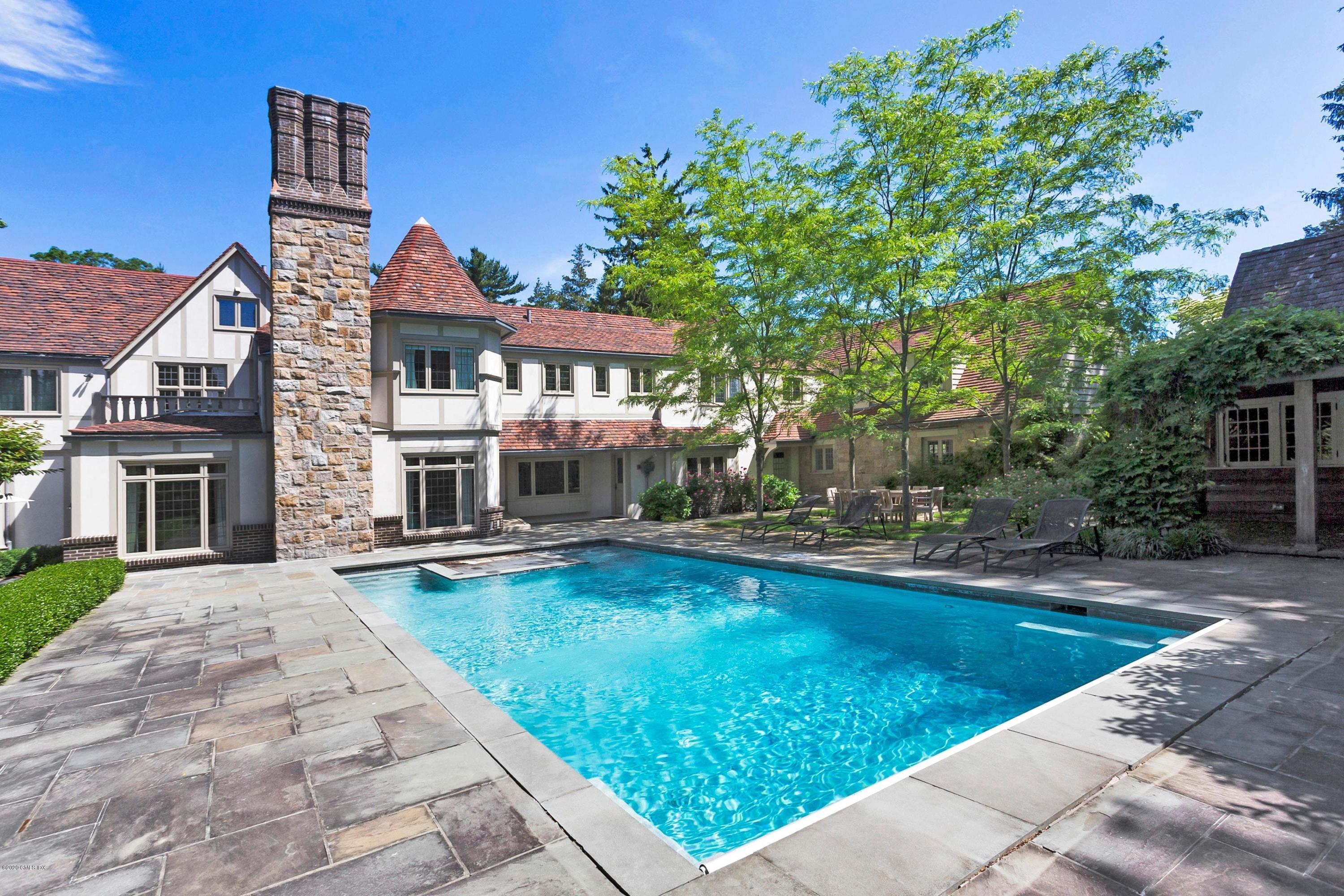 2 Broad Road Greenwich, CT 06830 - Photo 32 of 39 a view of a house with swimming pool