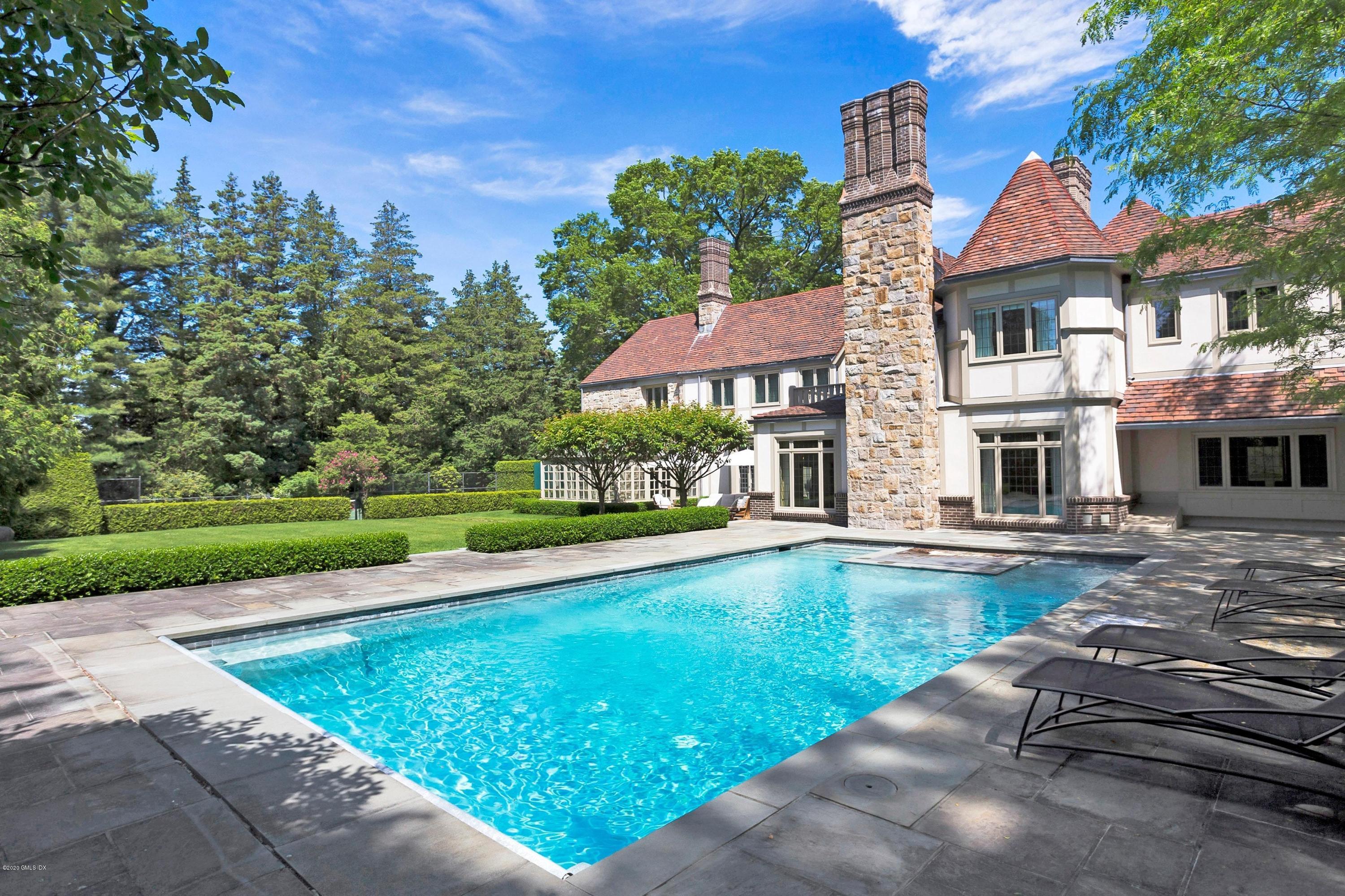 2 Broad Road Greenwich, CT 06830 - Photo 33 of 39 a view of a house with swimming pool yard and a patio