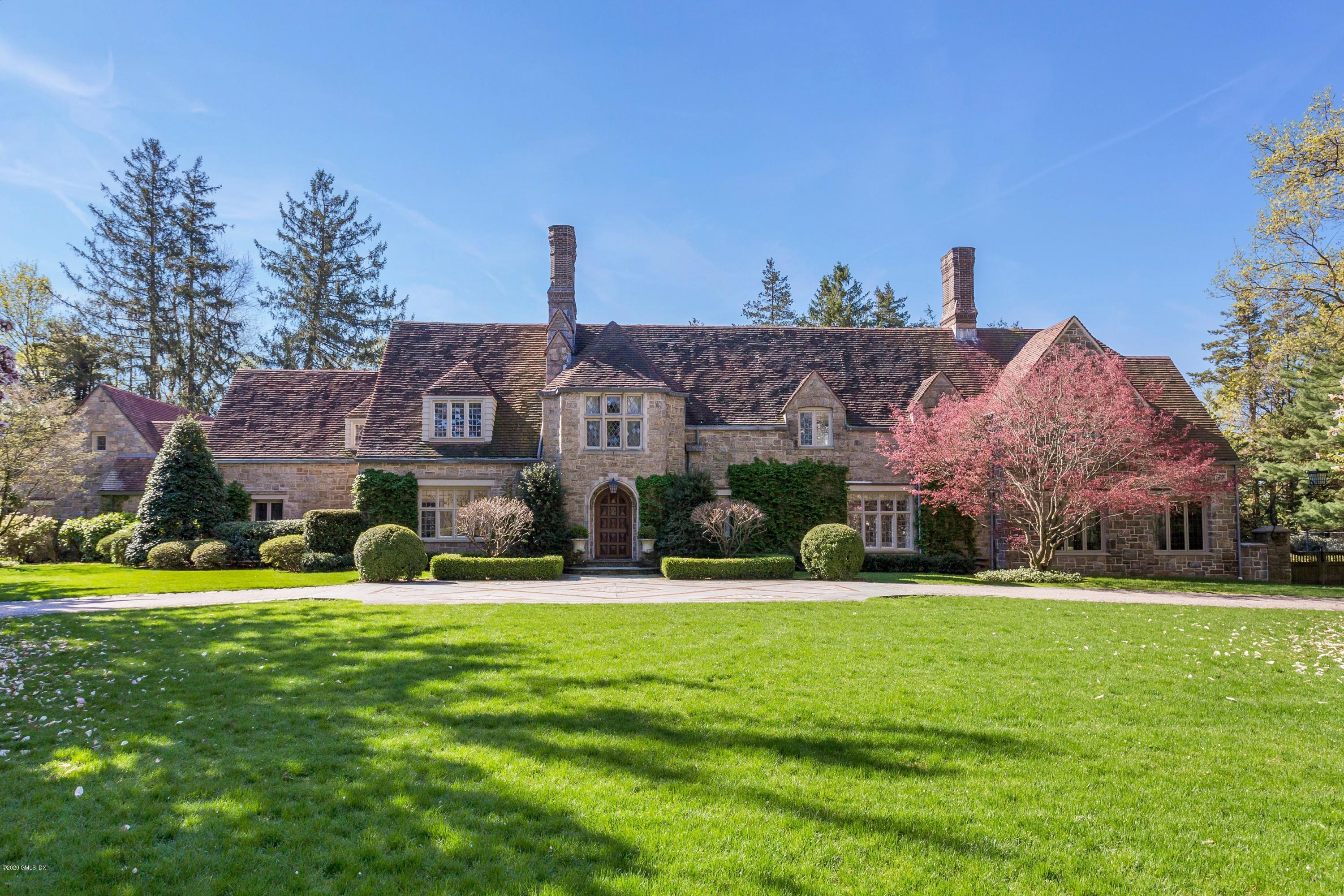 2 Broad Road Greenwich, CT 06830 - Photo 4 of 39 a view of a house with a yard and front view of a house