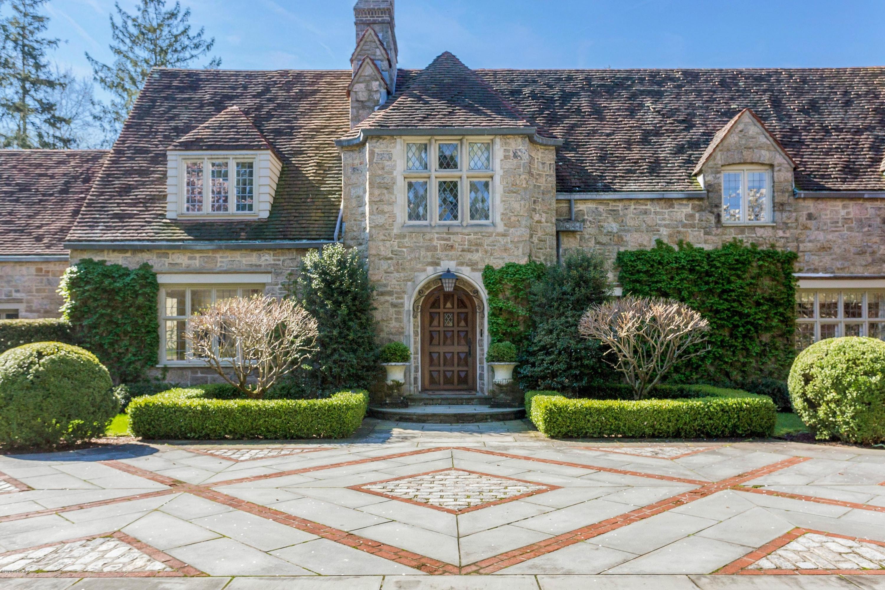 2 Broad Road Greenwich, CT 06830 - Photo 5 of 39 a front view of a house