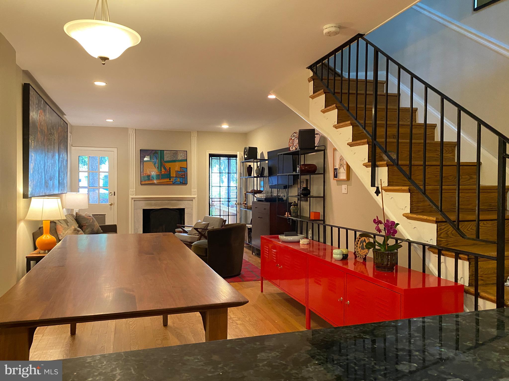 339 11th Street Southeast Washington, DC 20003 - Photo 31 of 39 a living room with furniture pool table and kitchen view