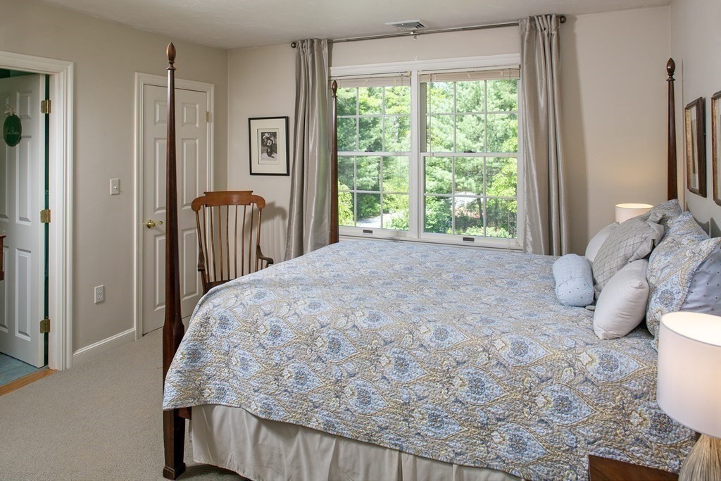 130 Union Bridge Road Duxbury, MA 02332 - Photo 15 of 33 a bedroom with a bed and a large window