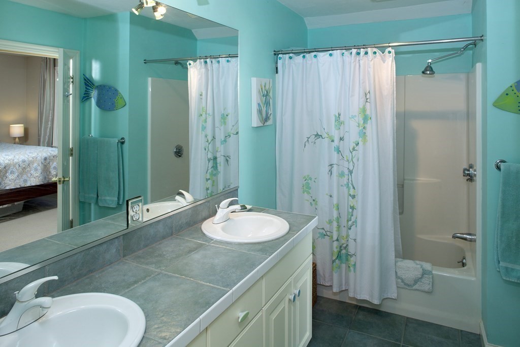 130 Union Bridge Road Duxbury, MA 02332 - Photo 16 of 33 a bathroom with a granite countertop sink toilet and shower