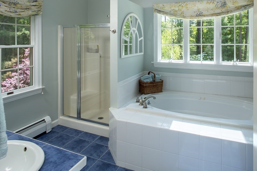 130 Union Bridge Road Duxbury, MA 02332 - Photo 21 of 33 a bathroom with a tub and a sink