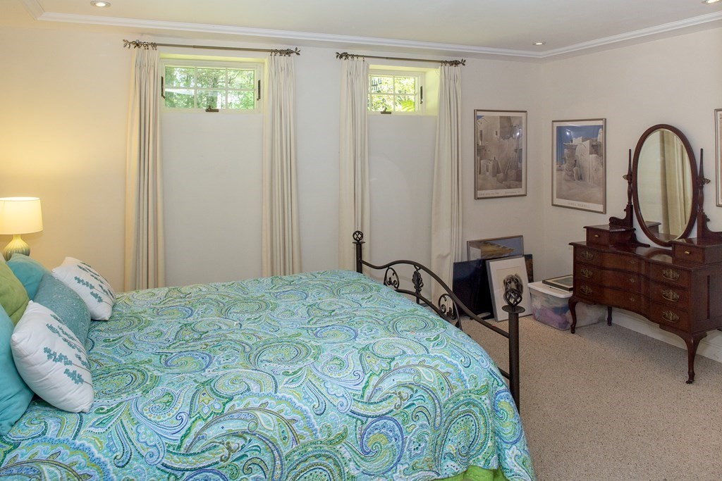 130 Union Bridge Road Duxbury, MA 02332 - Photo 22 of 33 a bedroom with a bed a desk and chair
