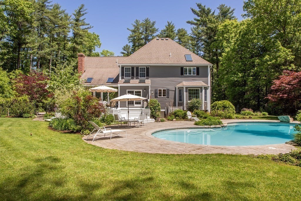 130 Union Bridge Road Duxbury, MA 02332 - Photo 26 of 33 a front view of a house with swimming pool having outdoor seating