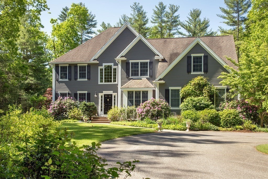 130 Union Bridge Road Duxbury, MA 02332 - Photo 30 of 33 a front view of a house with a yard