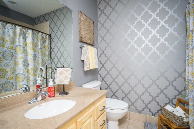 1267 Johnson Road Macon, GA 31220 - Photo 11 of 20 a bathroom with a sink toilet and a mirror