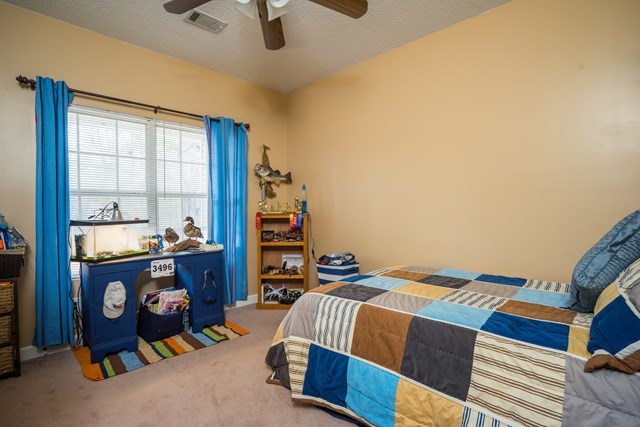 1267 Johnson Road Macon, GA 31220 - Photo 13 of 20 a bedroom with bed and balcony