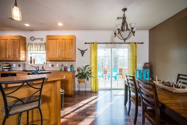 1267 Johnson Road Macon, GA 31220 - Photo 3 of 20 a view of a dining room with furniture window and outside view