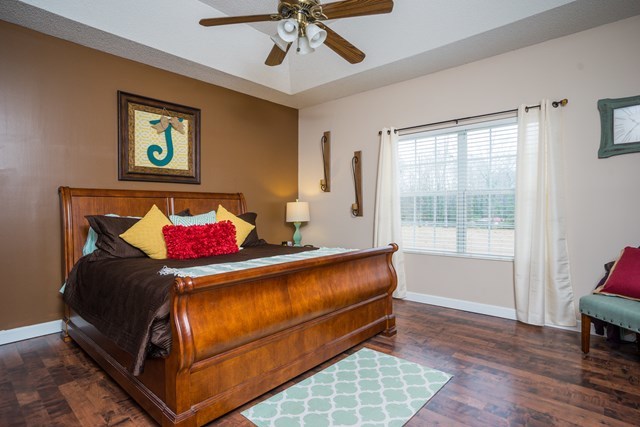 1267 Johnson Road Macon, GA 31220 - Photo 7 of 20 a bed room with a bed and a window