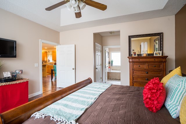 1267 Johnson Road Macon, GA 31220 - Photo 10 of 20 a bedroom with a bed and a dresser