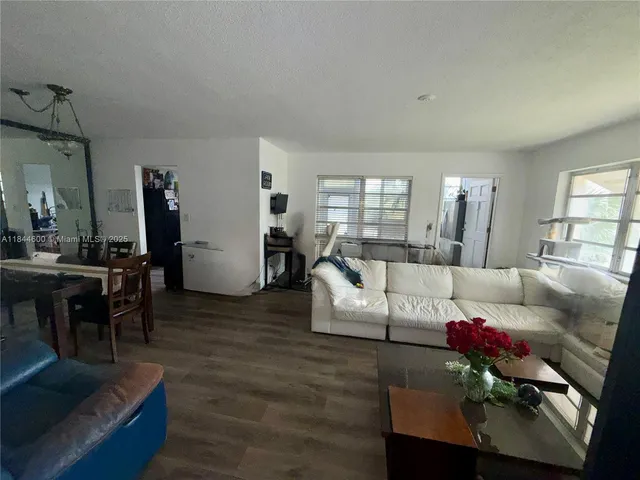 a bed room with furniture and a window