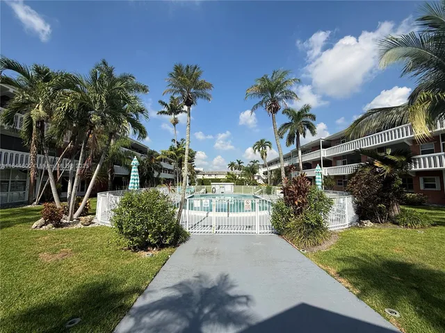 a view of a car parked in front of a building