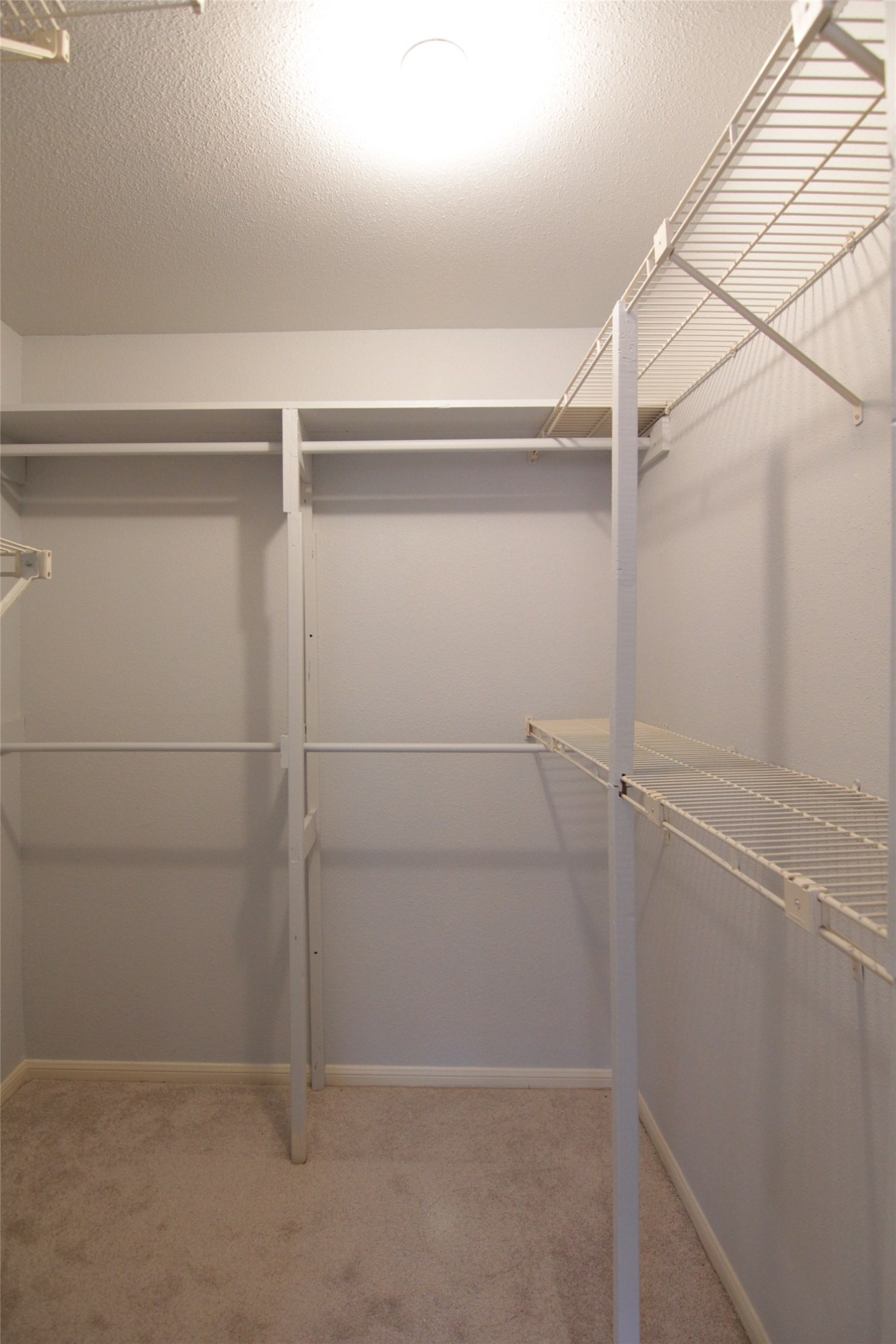 3100 Walnut Bend Lane, Unit 118 Houston, TX 77042 - Photo 14 of 20 a view of an empty walk in closet