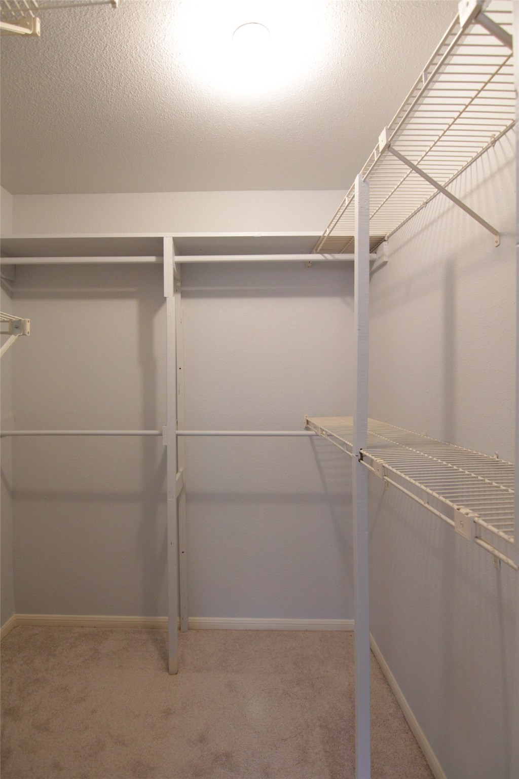 3100 Walnut Bend Lane, Unit 118 Houston, TX 77042 - Photo 14 of 20 a view of an empty walk in closet