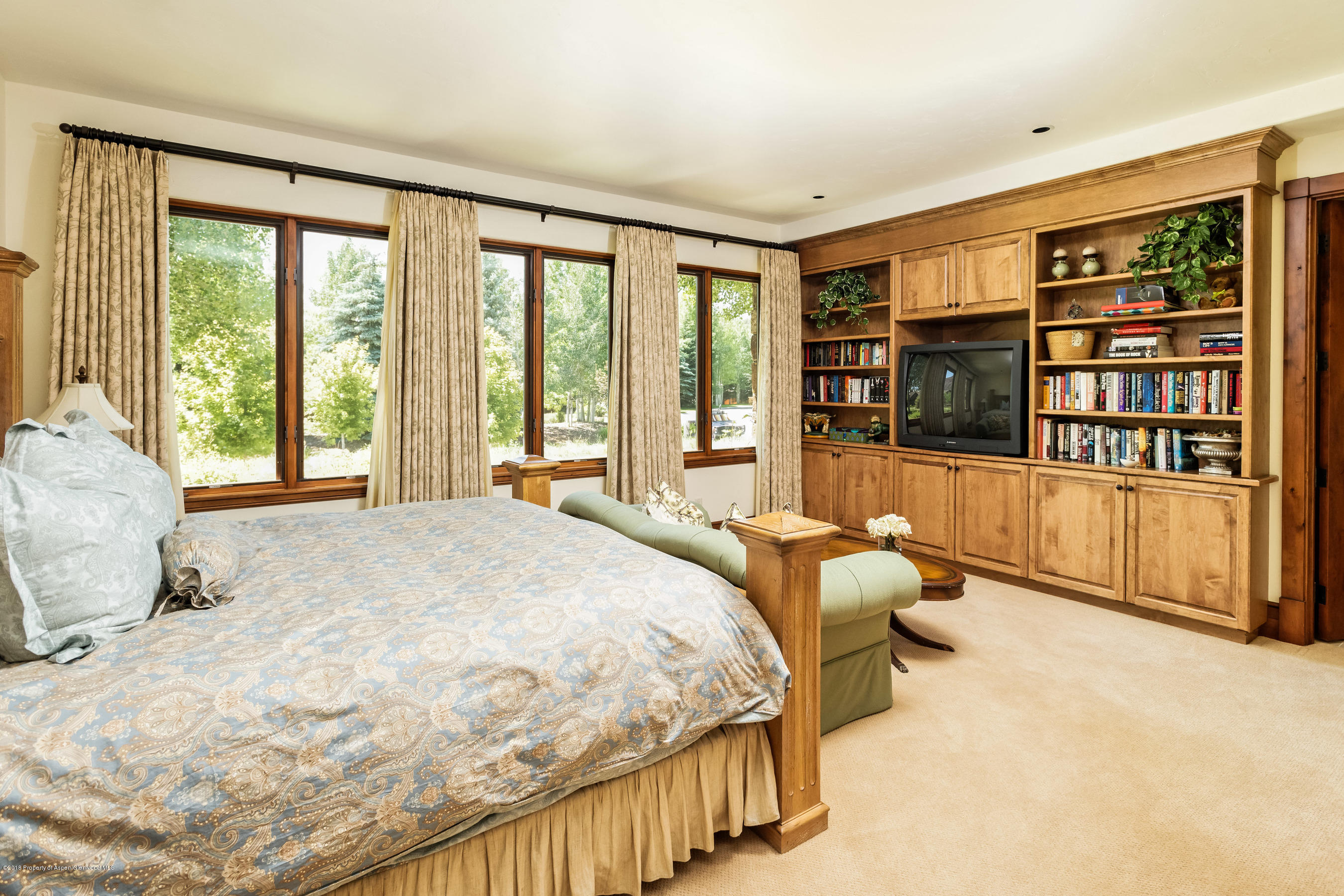 268 River's Bend Carbondale, CO 81623 - Photo 11 of 15 a spacious bedroom with a large bed and a large window