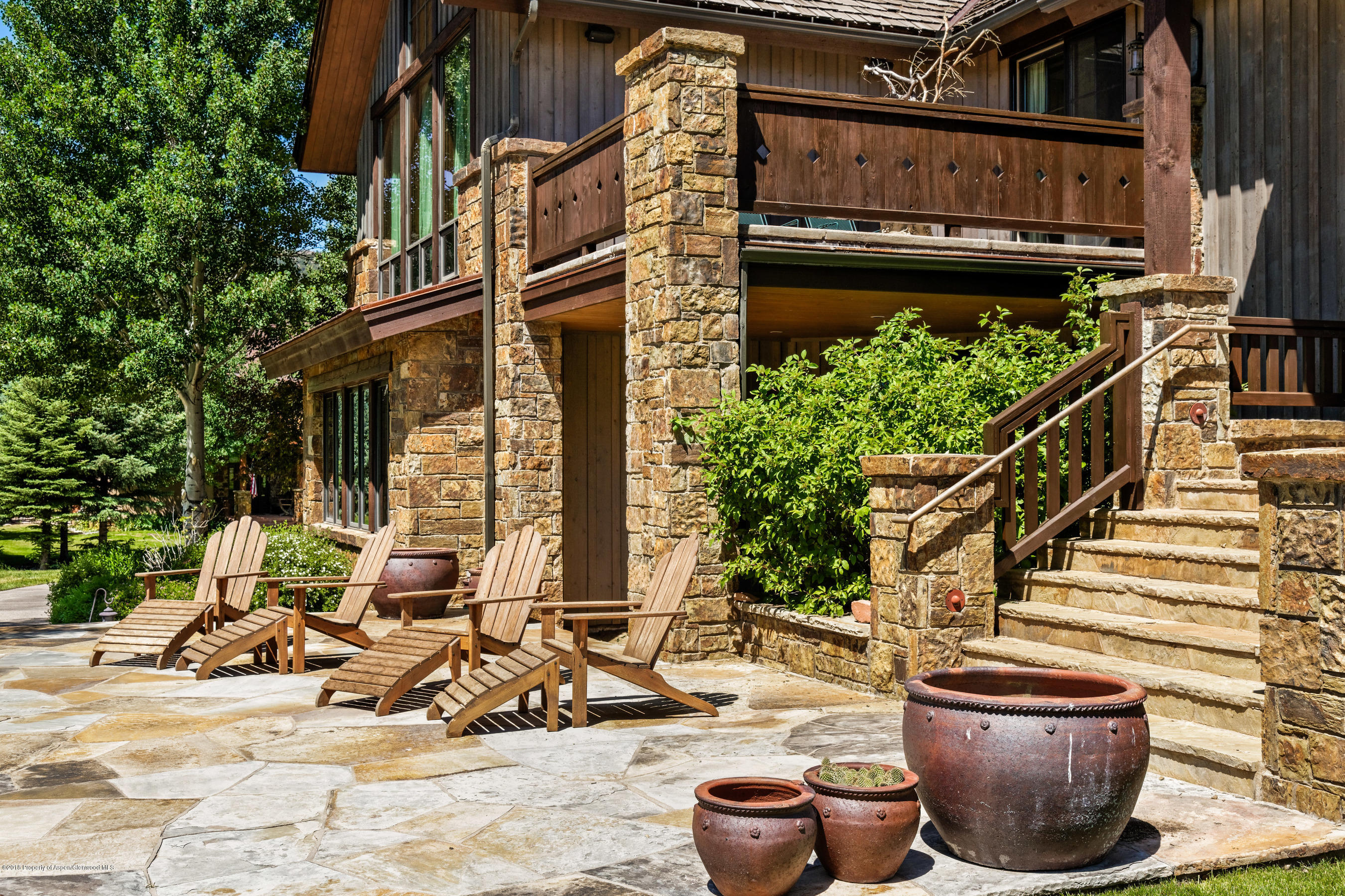 268 River's Bend Carbondale, CO 81623 - Photo 15 of 15 a view of a patio with table and chairs and potted plants