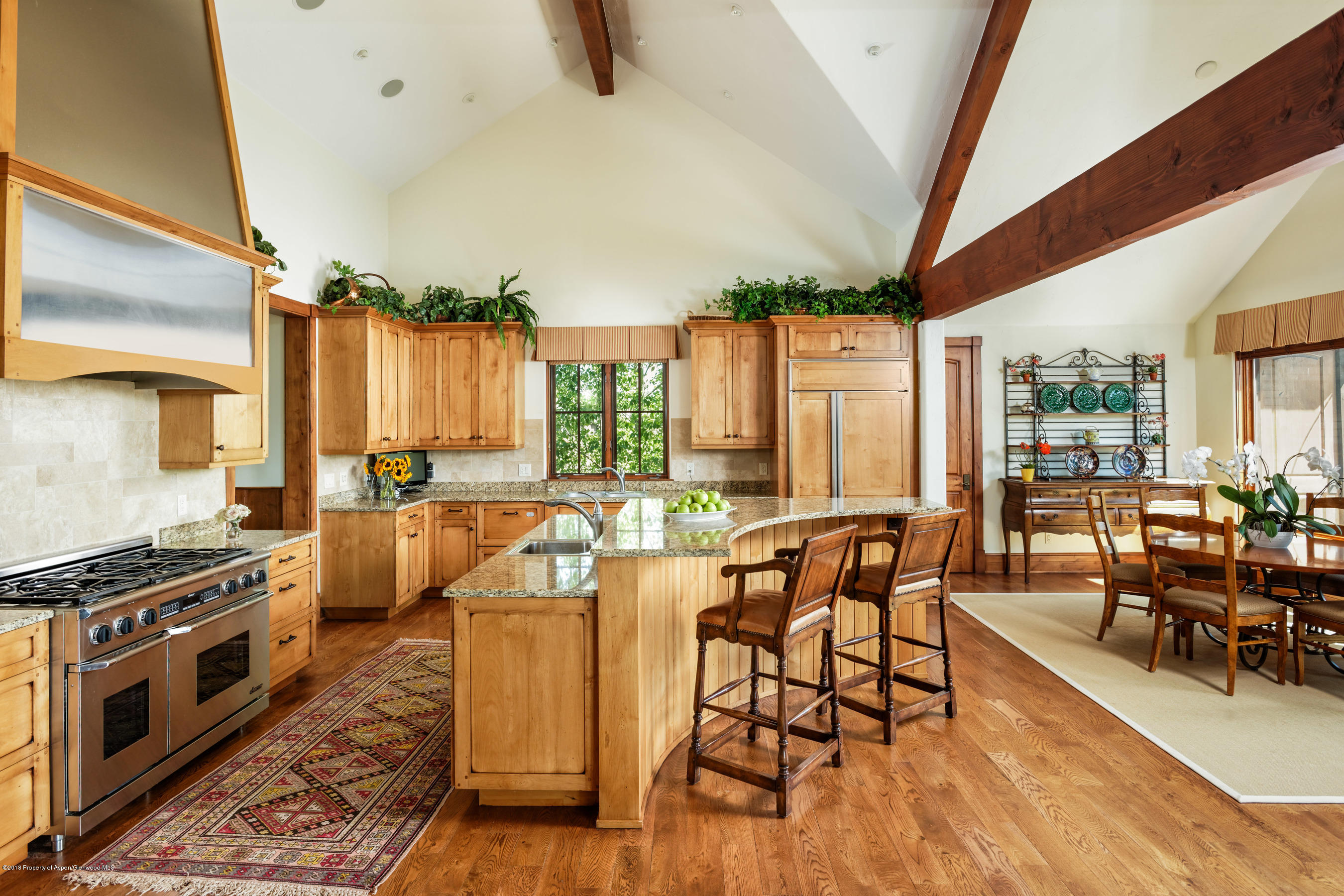 268 River's Bend Carbondale, CO 81623 - Photo 6 of 15 a view of a dining room with furniture window and wooden floor