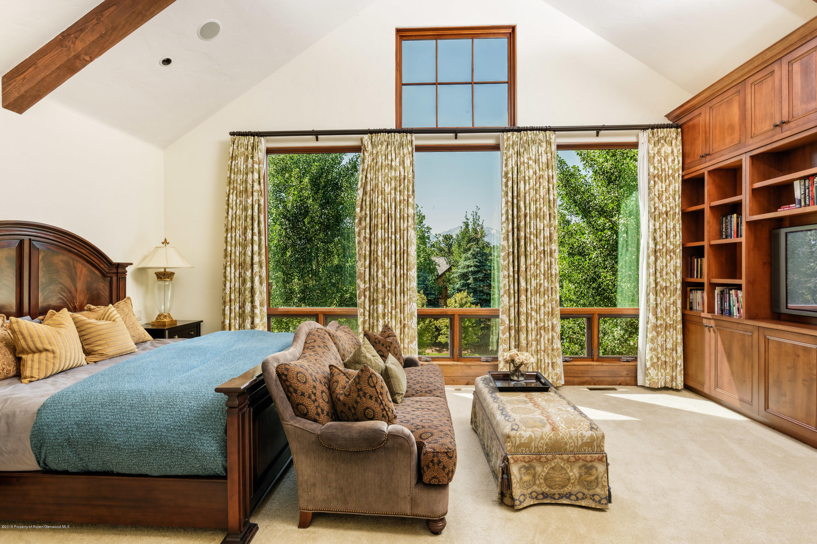 268 River's Bend Carbondale, CO 81623 - Photo 9 of 15 a bedroom with furniture and large windows