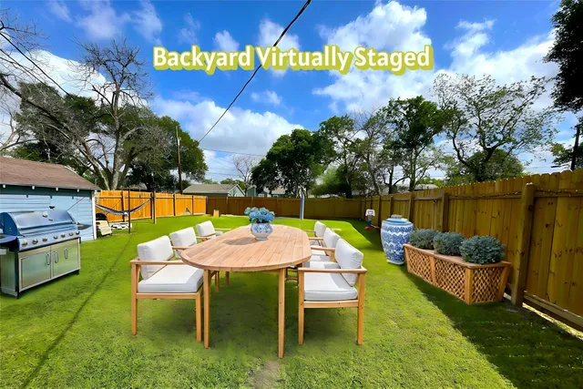 a view of a chairs and table in the patio