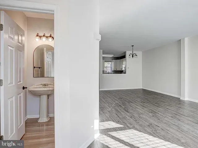 a view of a bathroom from the hallway