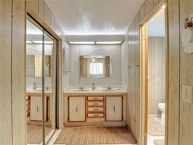 a view of cabinets with wooden floor