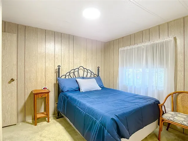 a view of an chairs and table in the patio